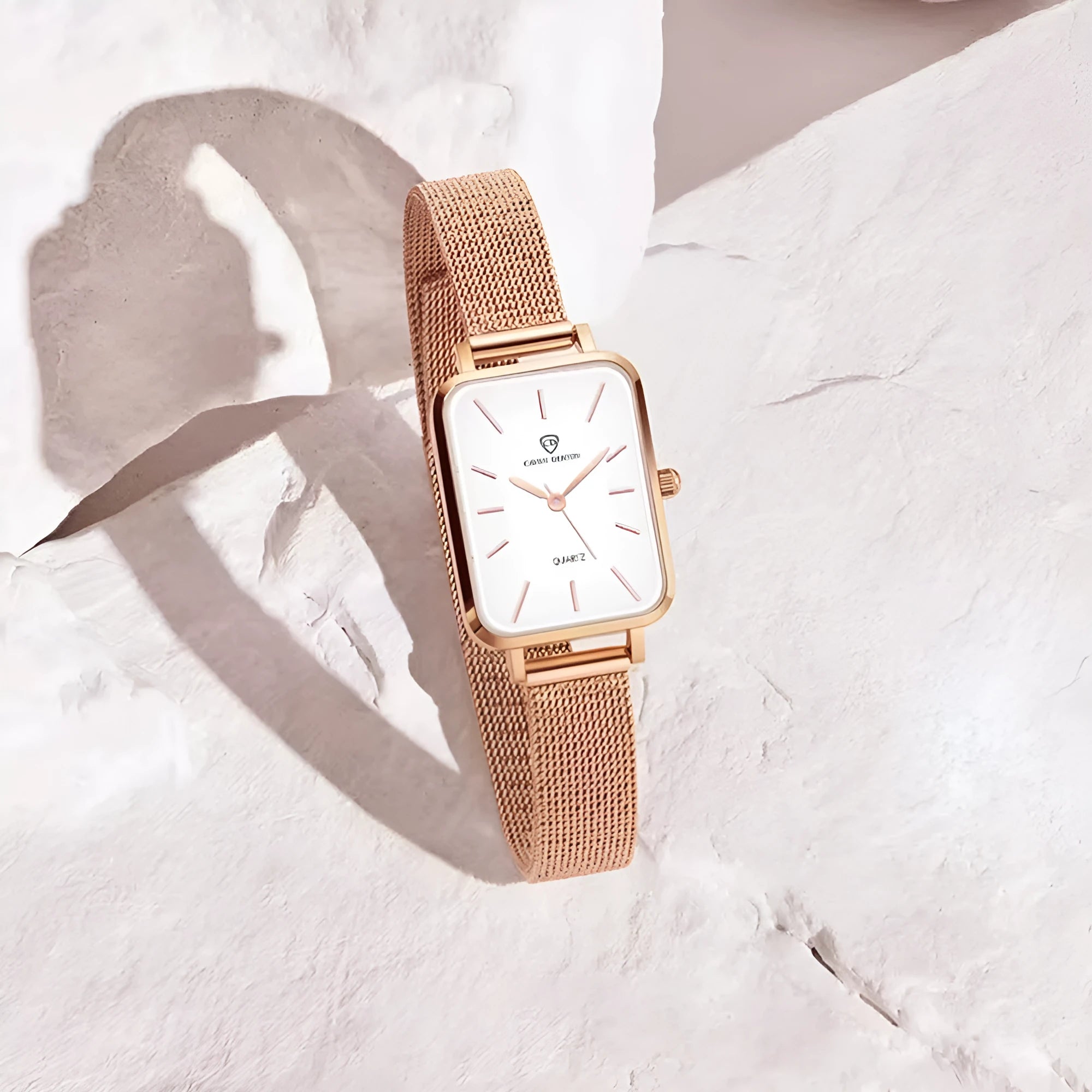 Women's waterproof quartz watch with woven steel strap and alloy case in rose gold or silver