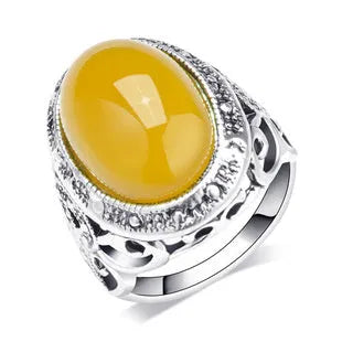 Retro geometric alloy ring with fluorescent beeswax plating in antique silver amber colour.