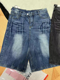Men’s loose straight-leg washed denim shorts in blue side view