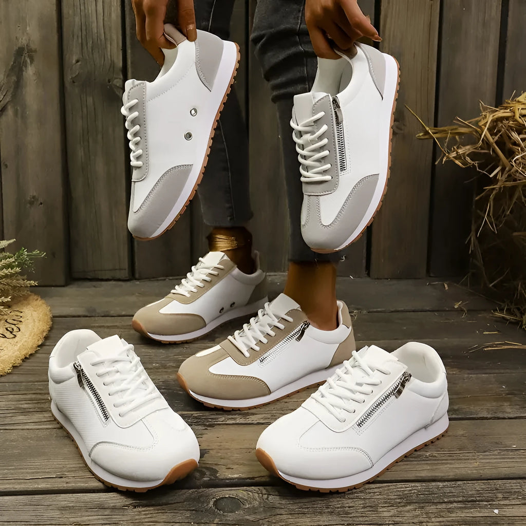 Women's flat shoes in champagne, grey and white with an artificial PU upper and rubber sole.