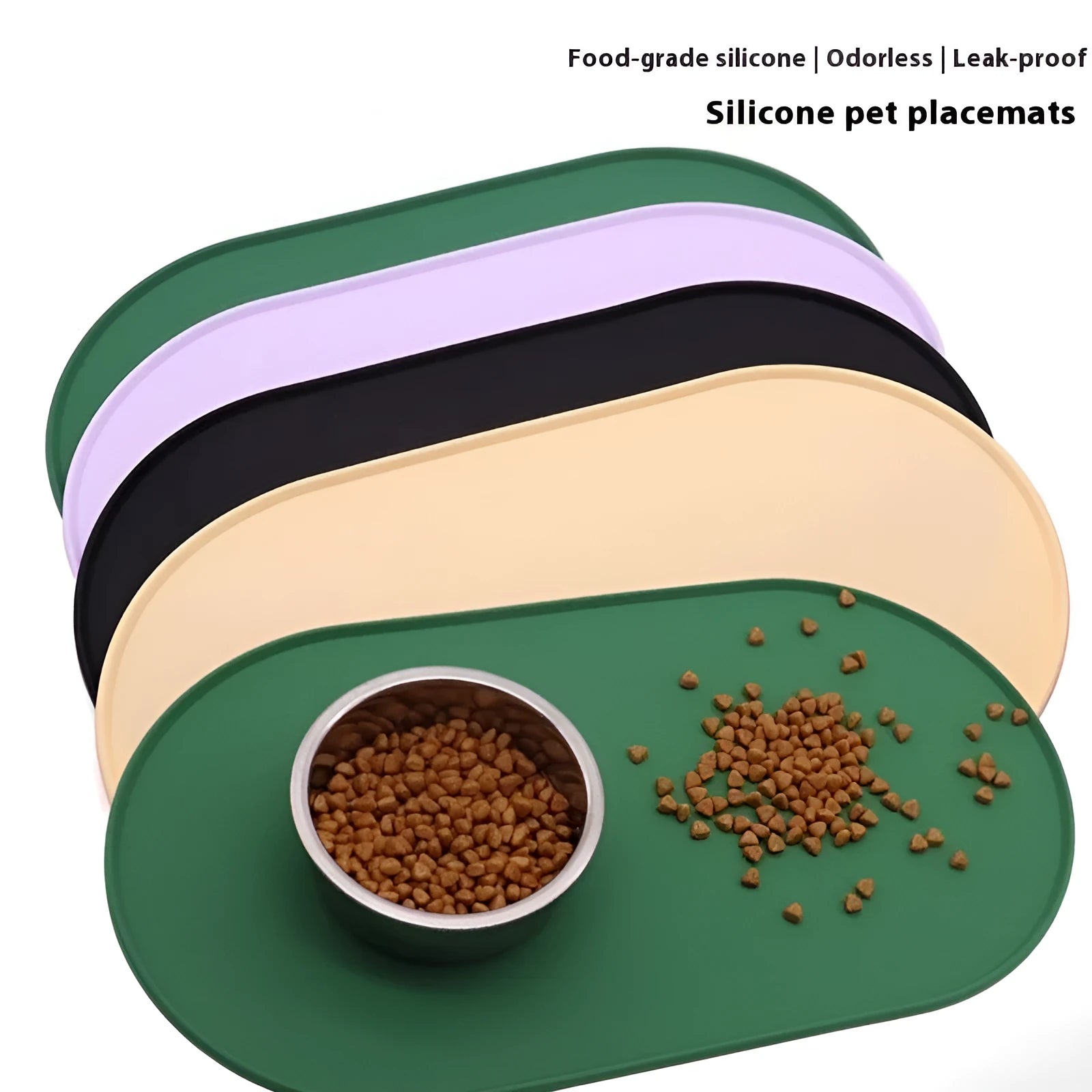 Green silicone cat feeding placemat with food and water bowls on a wooden floor