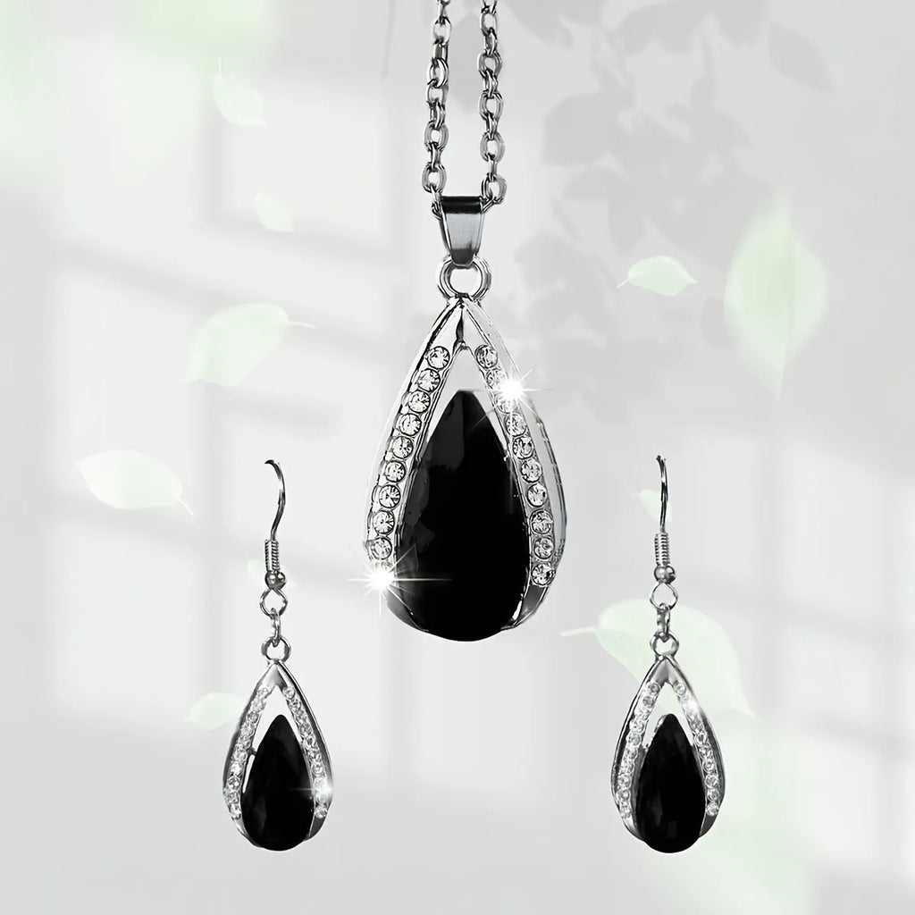 Teardrop glass pendant necklace and matching earrings set in black or red alloy jewellery