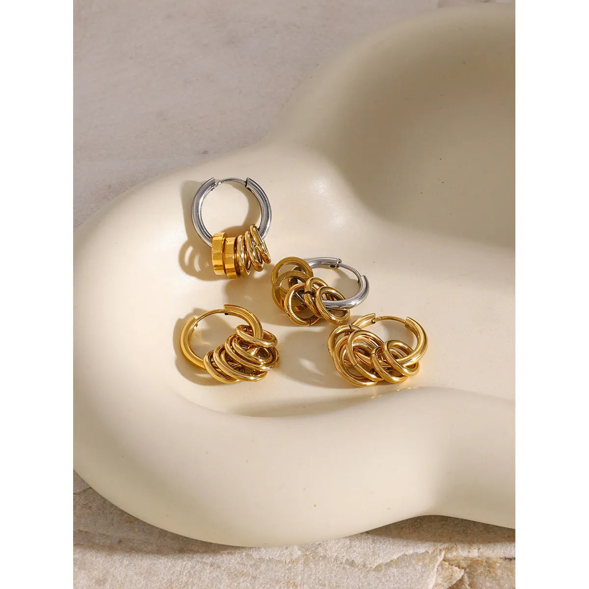 Stainless steel electroplated earrings in silver and rose gold tones with ins style design