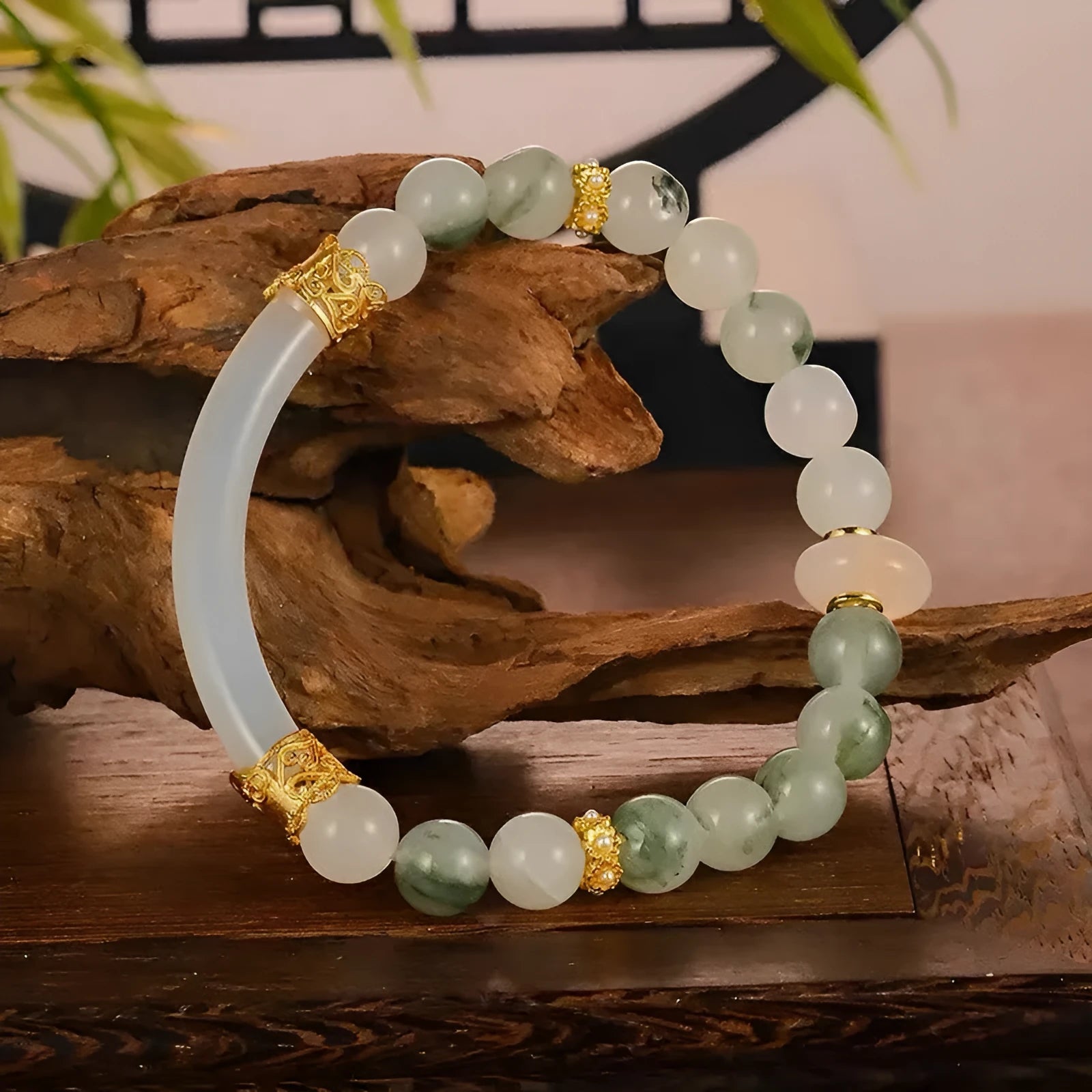 Emerald green Tian Shan Cui stone women's bracelet with floating floral motif and circular pattern