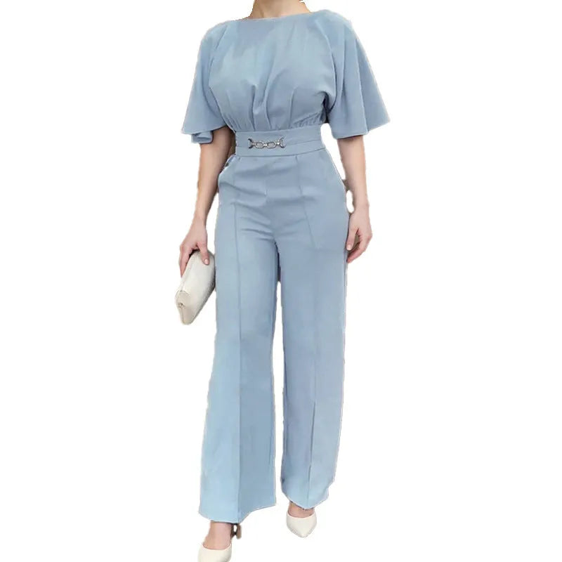 Blue men's two-piece casual suit with long sleeves and trousers on a model