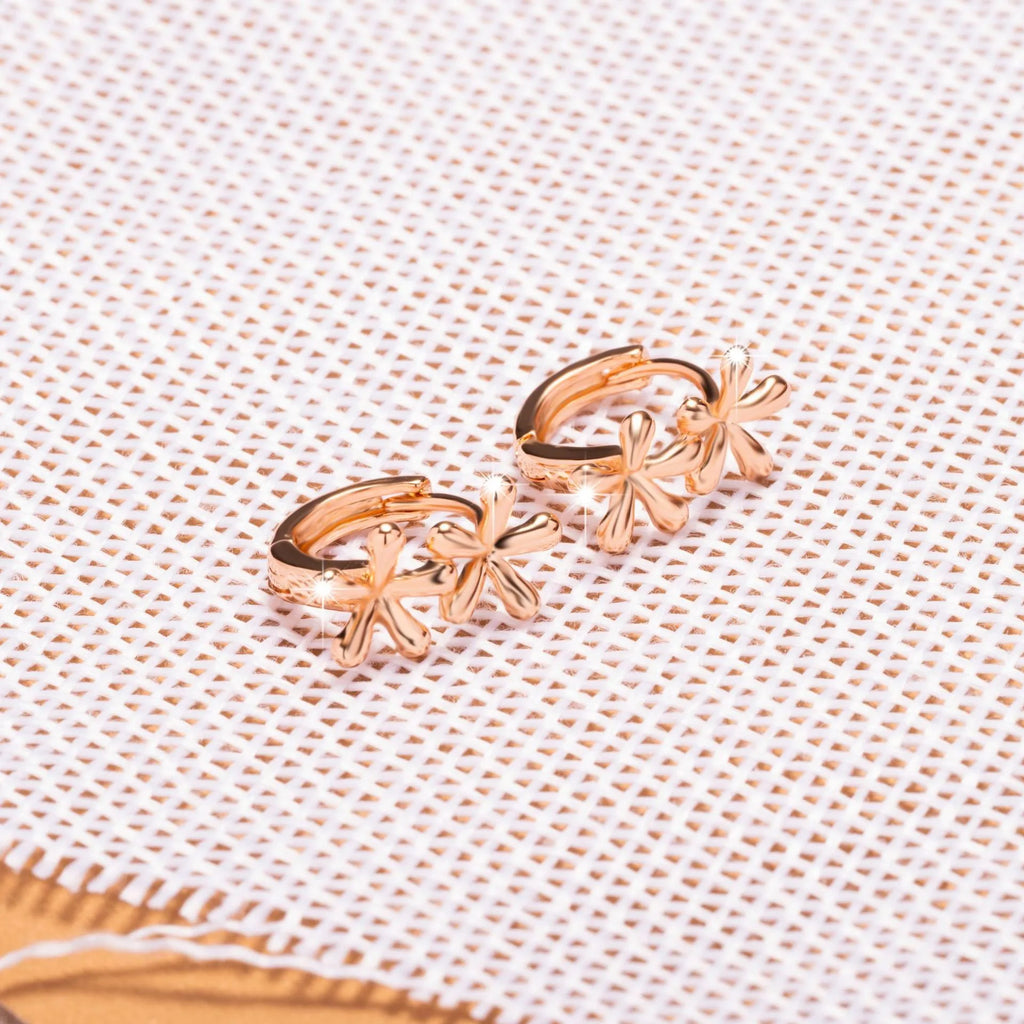 Circular rose gold electroplated earrings with waterdrop flower pattern for women