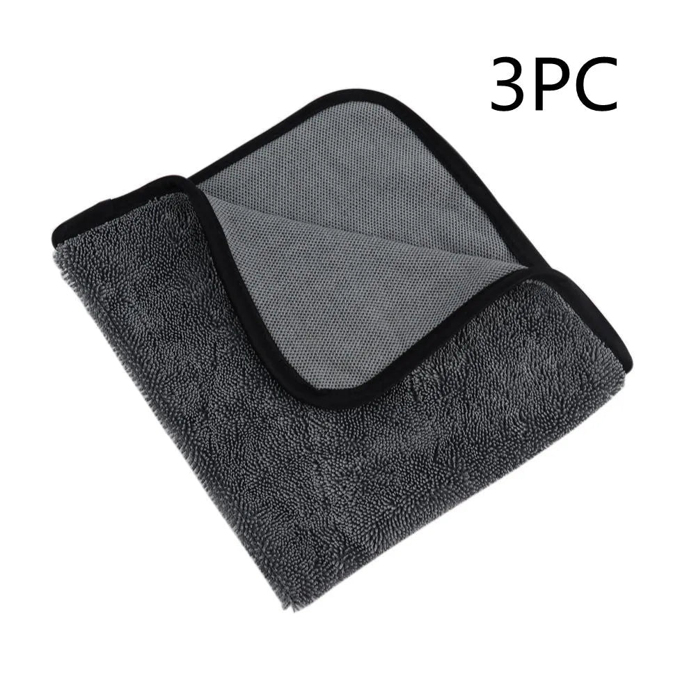 Grey microfiber car wash towel lying flat, showing its 40x40cm square size.