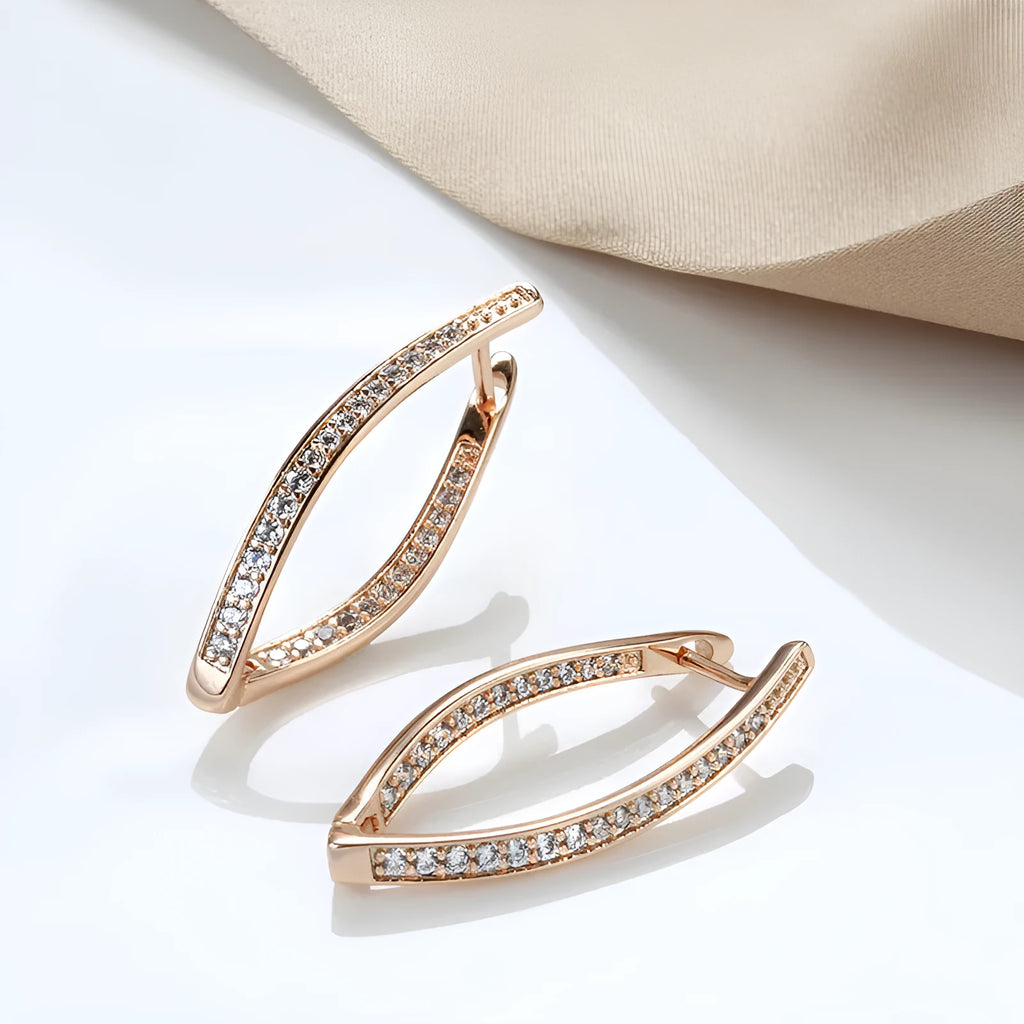 A pair of geometric drop earrings for women made from copper with zircon accents in H0493 colour.