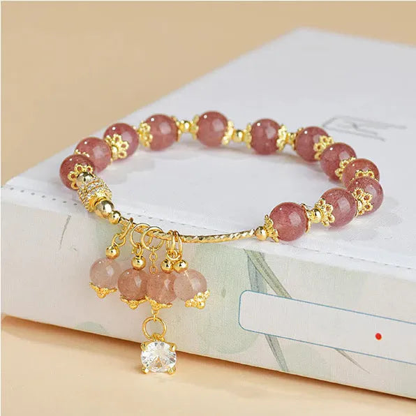 Pink strawberry quartz crystal bracelet with heart shape and pearl accents