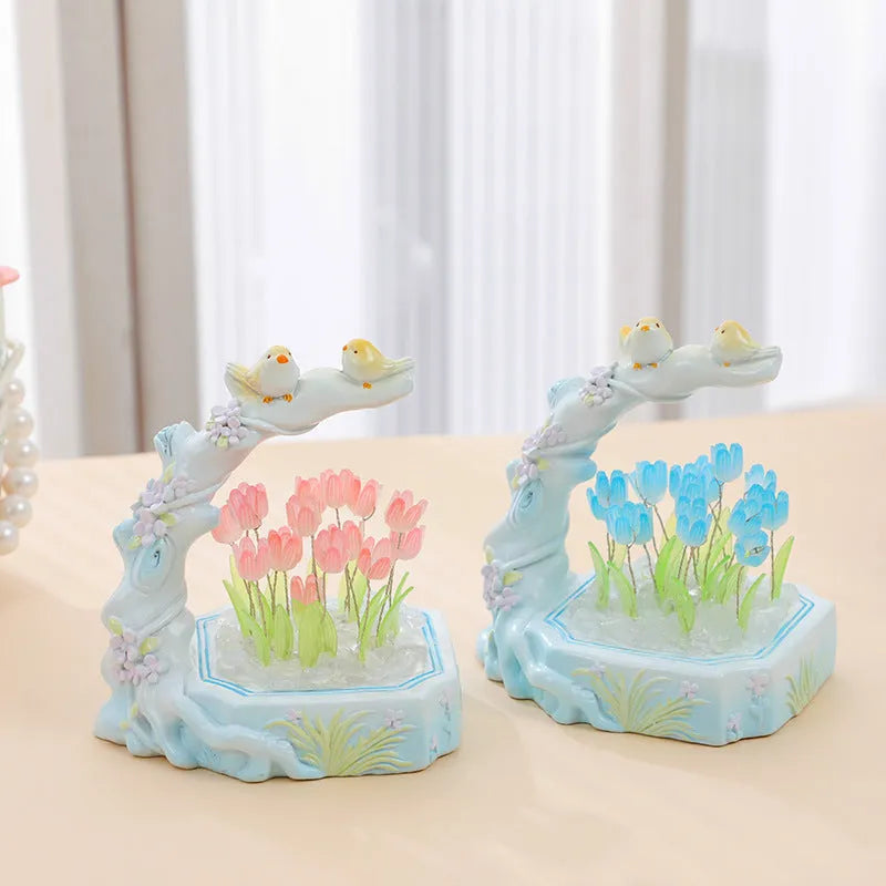 Resin tulip-shaped decorative night light assembled from DIY material package on a desk.
