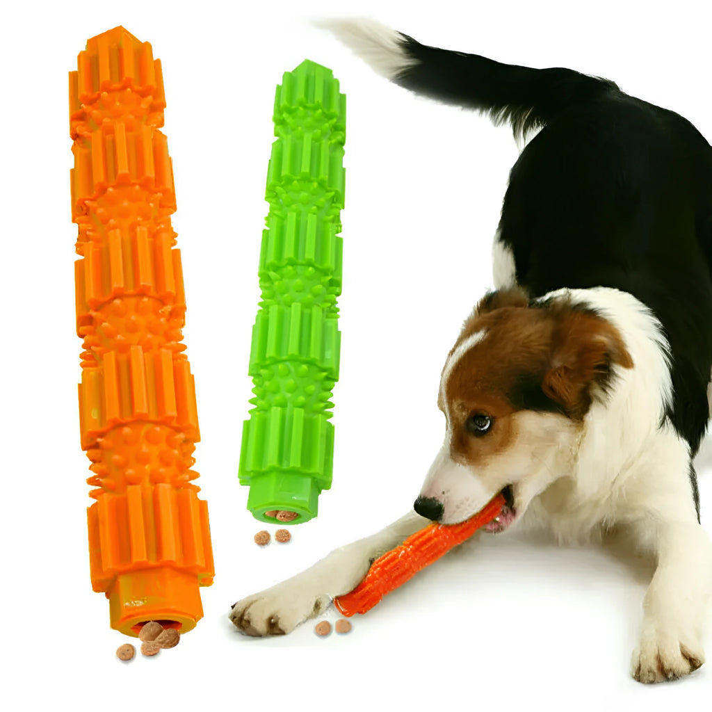 Green and orange natural rubber dog chew toy with treat holes and squeaker for small to medium aggressive chewers.