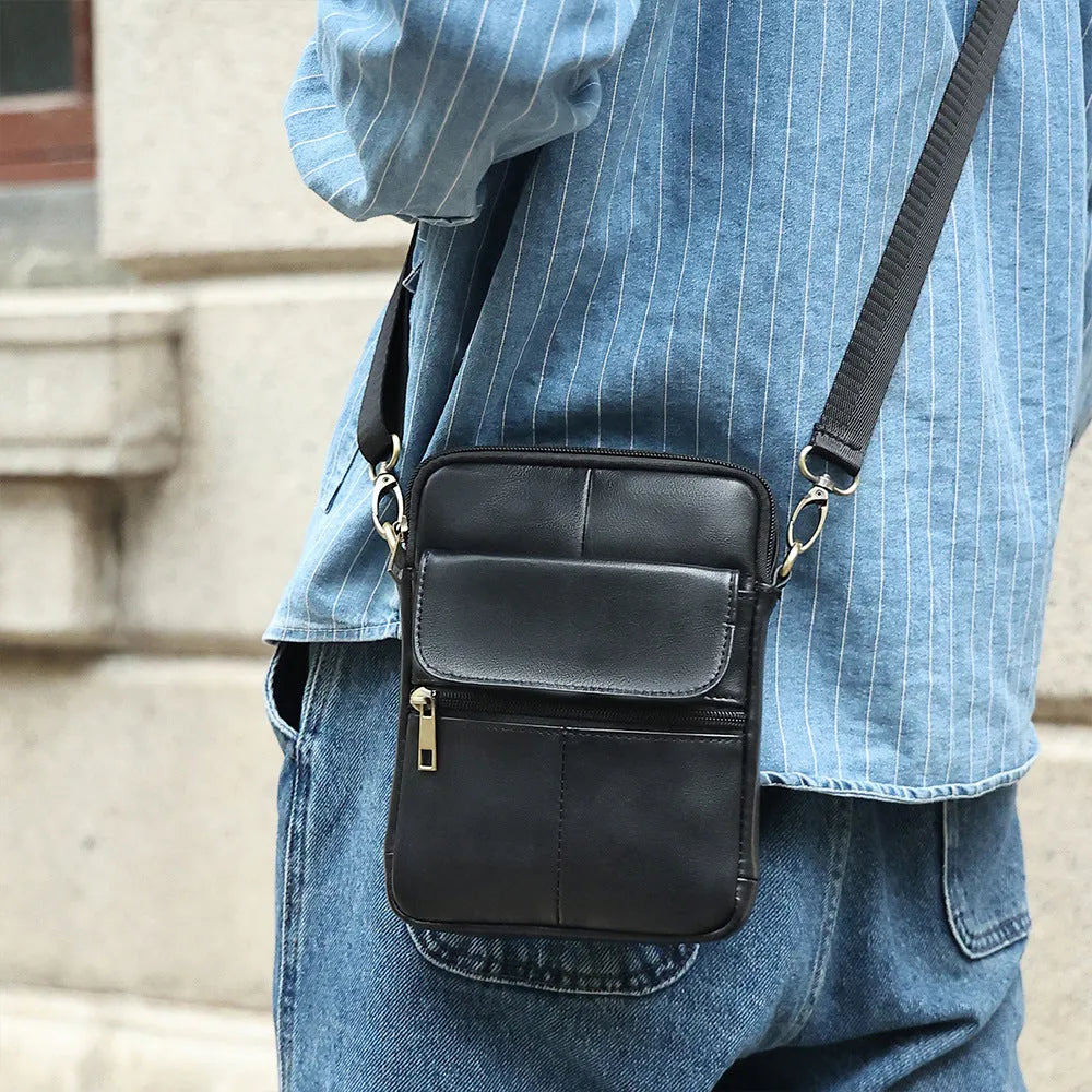 Men's brown leather crossbody shoulder bag with visible sewing lines