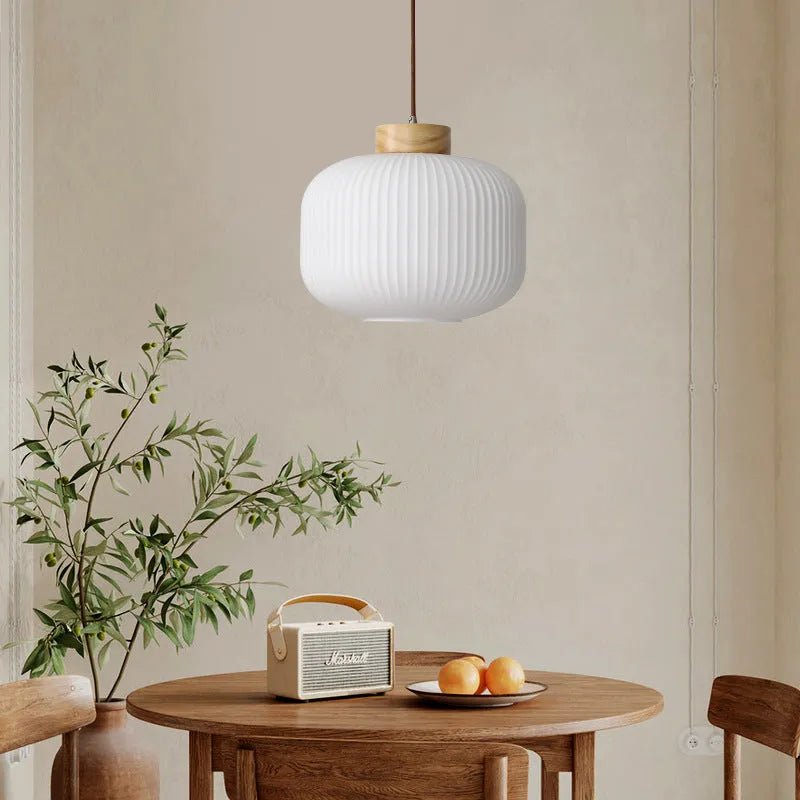 Nordic style wooden pendant ceiling light with solid wood retro design in a bedroom setting.