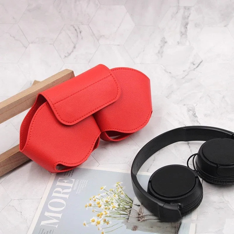 AirPods Max headset inside a black PU leather protective case with stitching