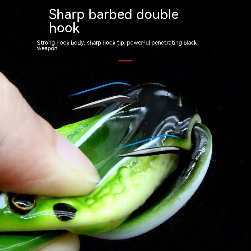 Bionic frog fishing lure with realistic snake head design and double hooks in grass green colour