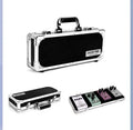 Aviation flight box guitar effect processor unit in T-EC8 trumpet style on a dark surface.