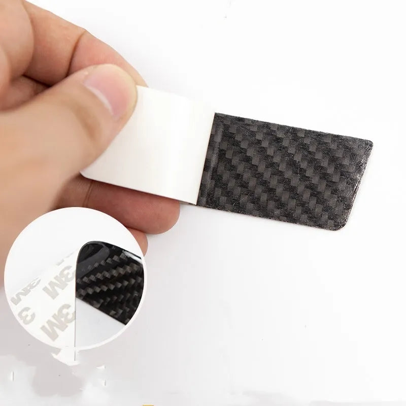 Carbon fibre patterned adhesive door handle patches for Tesla Model S interior protection