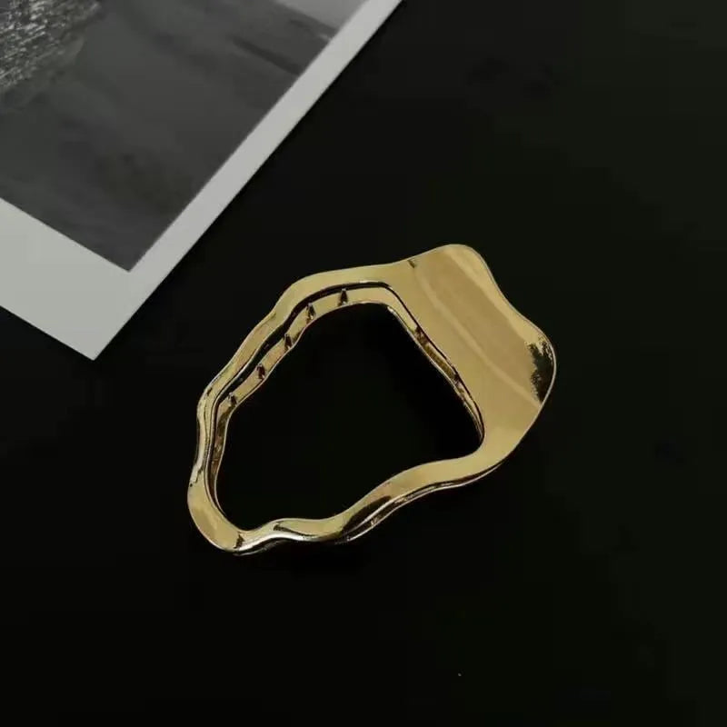 Women's geometric zinc alloy hair barrettes in gold and silver polished finishes