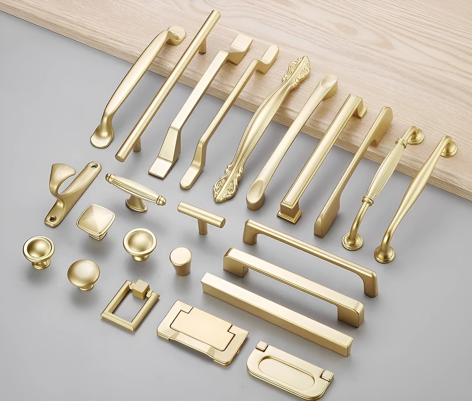 Gold aluminium alloy T-shaped open cover cabinet drawer pull handle for single-hole mounting.