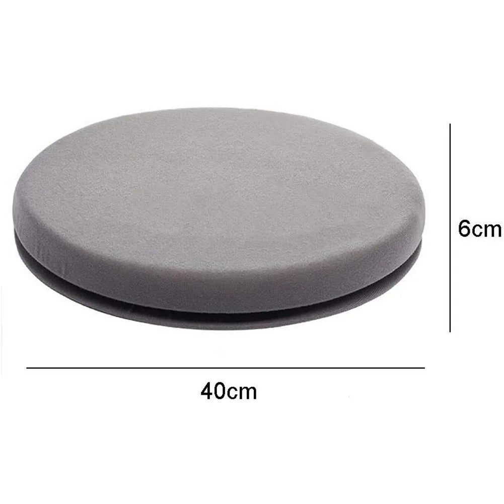 Grey rotating car seat cushion with non-slip base on a car seat.