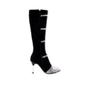 Grey and black women's knee-high boots with a thin high heel on a plain background.