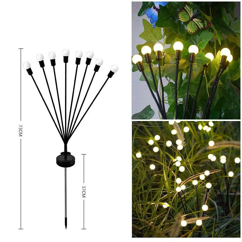Solar-powered LED garden ground light with multiple LED heads and a stainless steel ground spike.