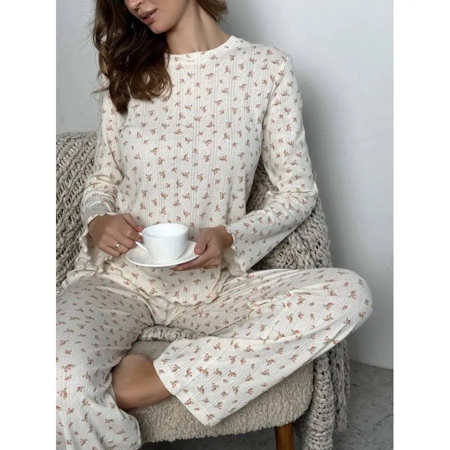 Women's white floral print lounge suit with bell sleeves and wide leg trousers
