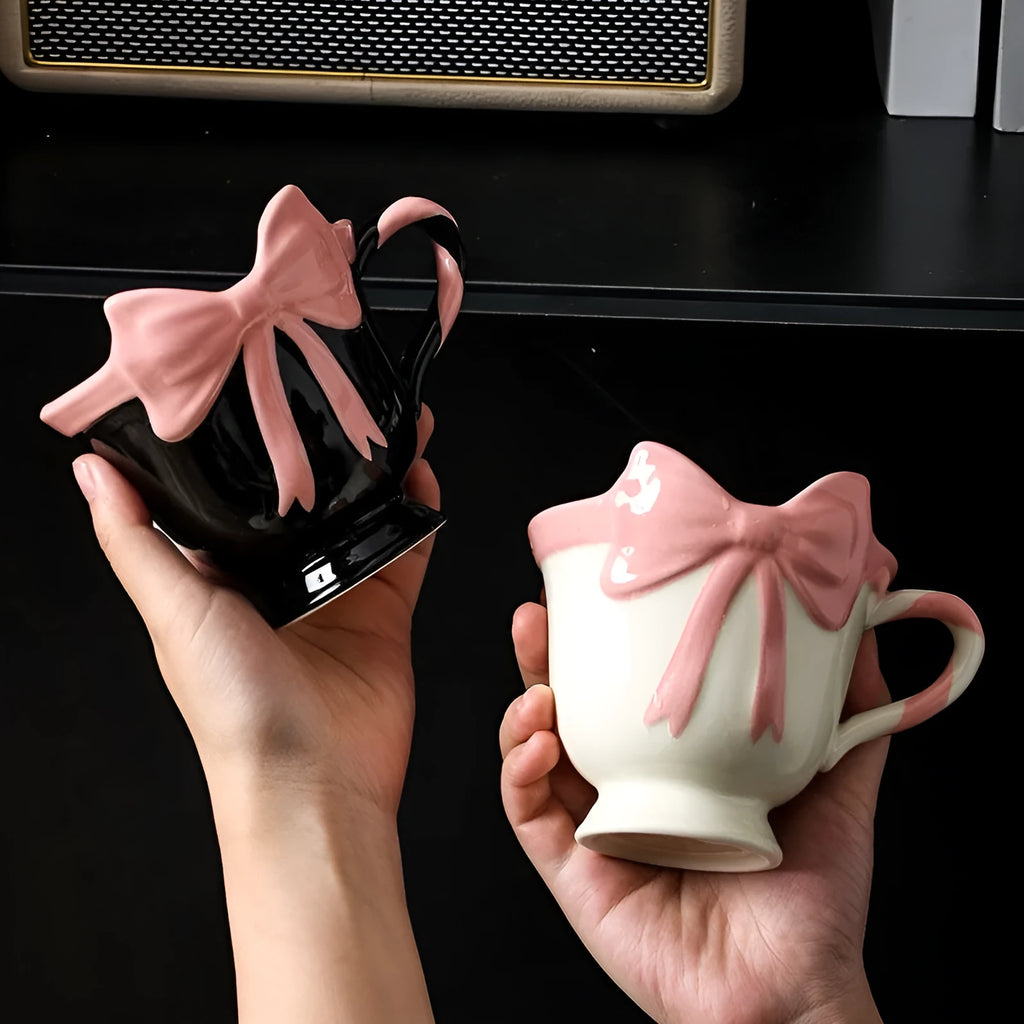 Ceramic mug with heart and bow design in Black Pink colour, showing 301-400ml capacity.