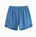Laser-stitched black running shorts with stretch Spandex fabric laid flat.