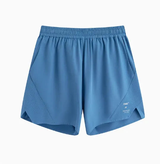 Laser-stitched black running shorts with stretch Spandex fabric laid flat.