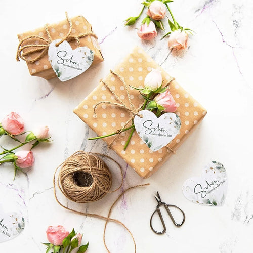 Set of 50 heart-shaped paper gift tags with floral design in two colour style options