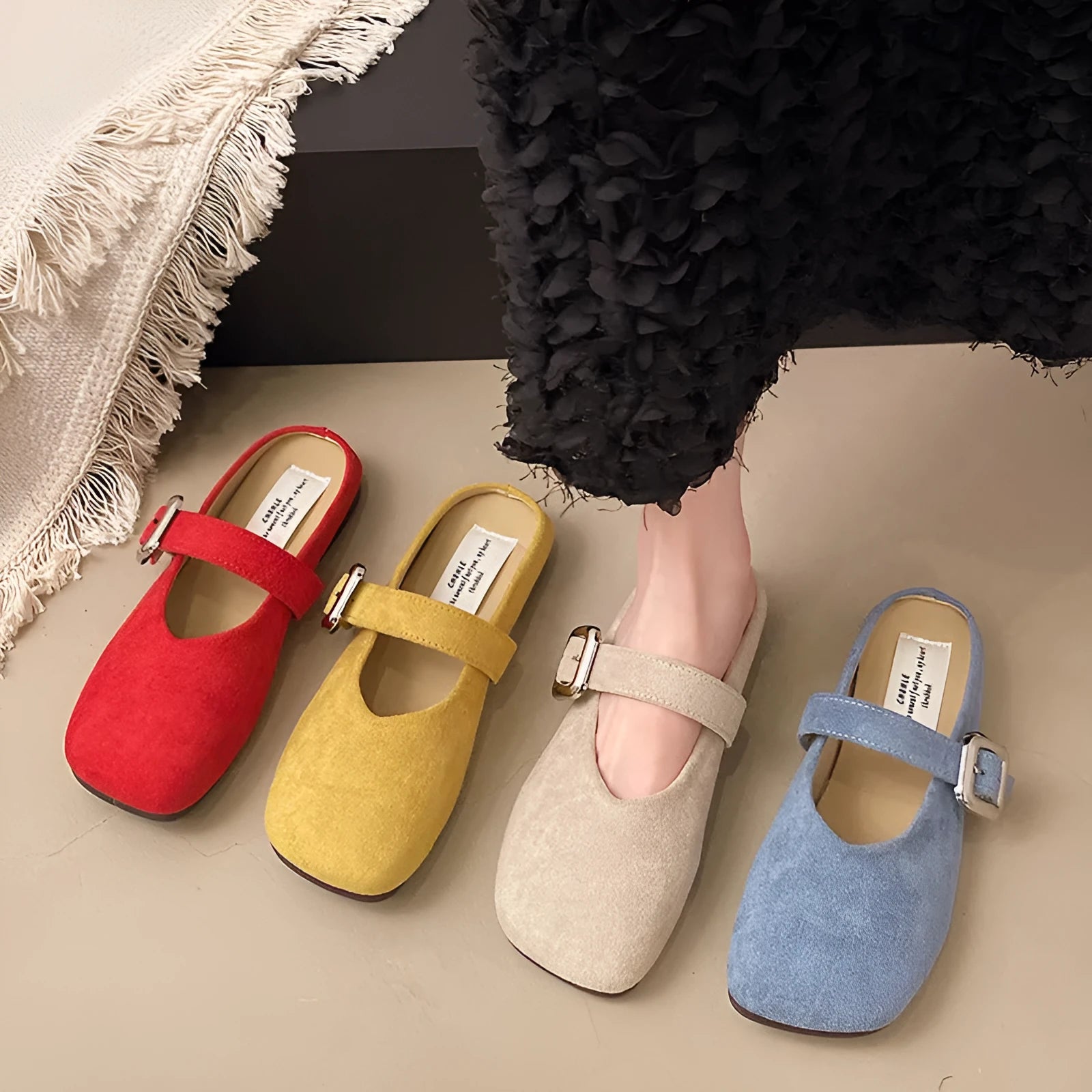 Women's flat closed toe half slippers in PU material with square toe design and rubber sole