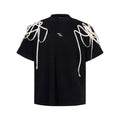 Black loose fit T-shirt with rivet ribbon padded shoulder details and short sleeves