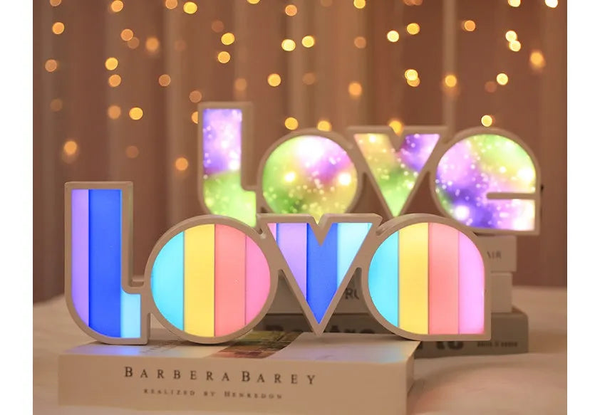 Colourful rainbow LED decorative light spelling LOVE, with USB cable, for Valentine's Day or wedding decor.