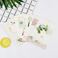 Set of nine minimalist cartoon postcards showing retro Paris towers and historic landmarks.