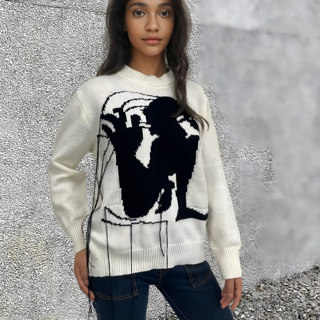 Women's loose grey alpaca wool sweater with tassel design and abstract pattern