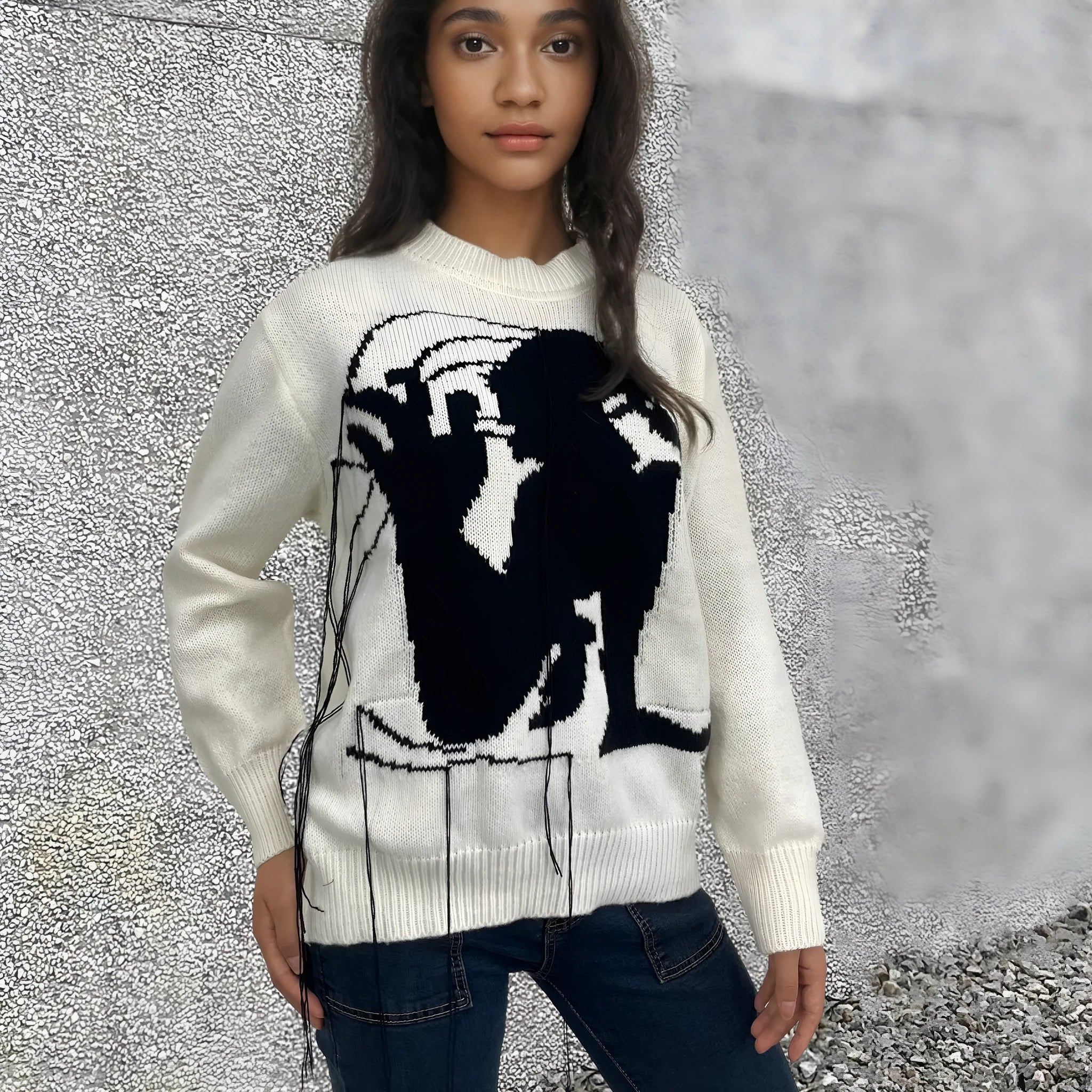 Women's loose grey alpaca wool sweater with tassel design and abstract pattern
