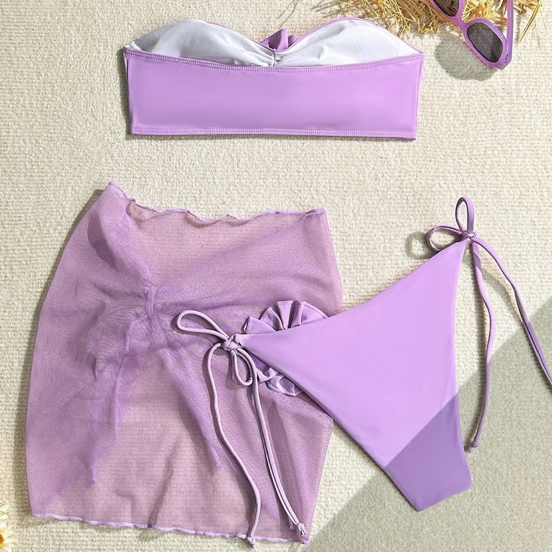 Women's pink tube top swimsuit with three-dimensional flower tie and matching skirt set