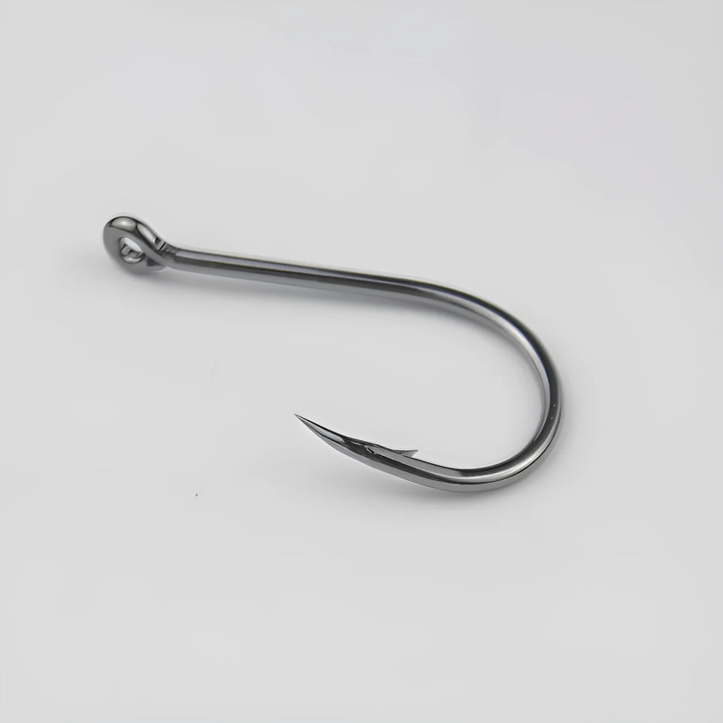 Barbed fishing hooks with hole ring in a bulk pack on a blue background.