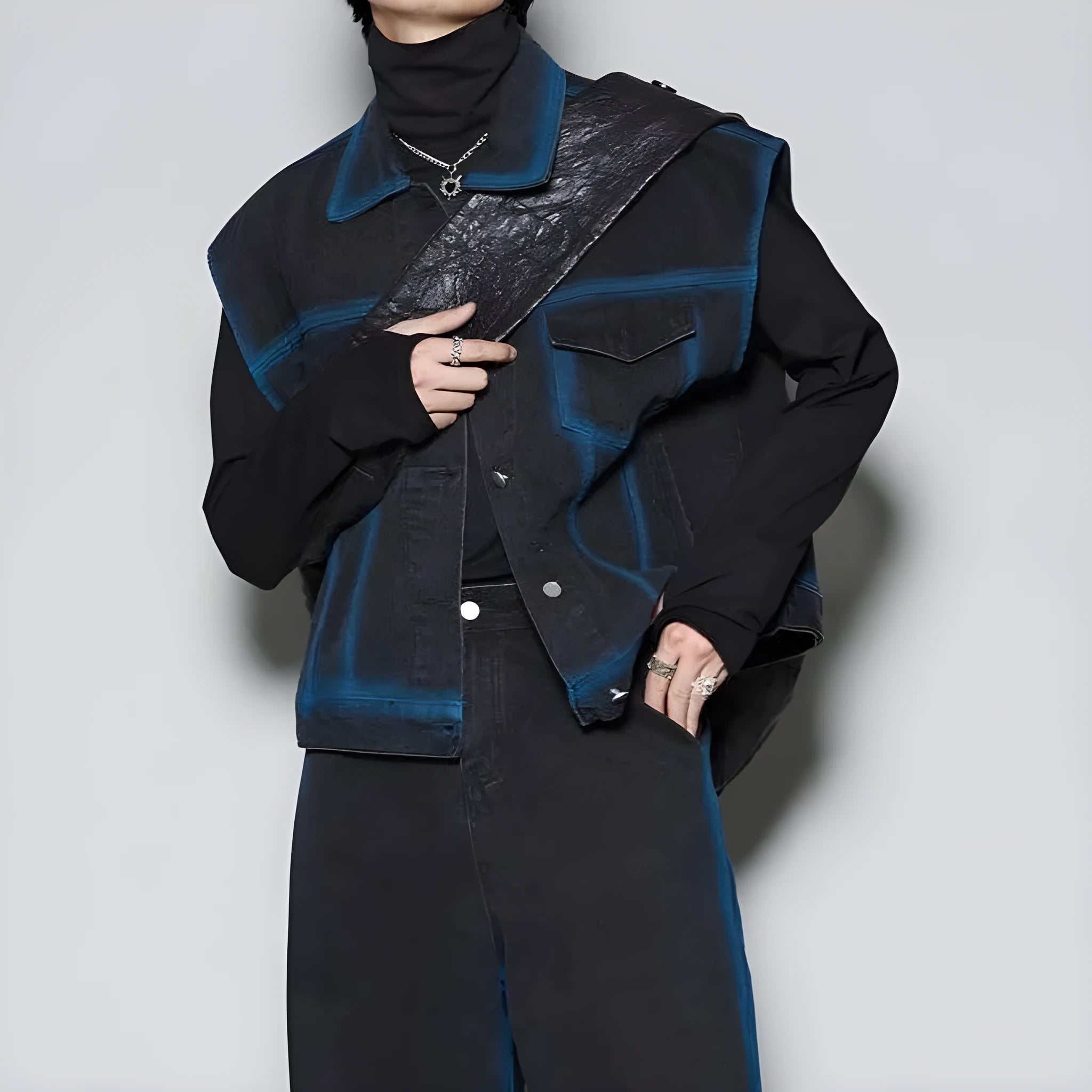 Blue distressed fleece-lined denim vest and jeans two-piece suit set laid flat