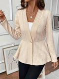 Women's apricot jacquard knit cardigan with one button, shown on a model.