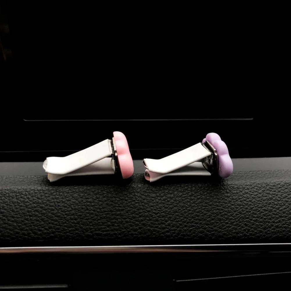 Resin Baiyun cloud cartoon car air freshener clip in pastel colours for vehicle vents.
