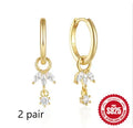 S925 sterling silver earrings with geometric sunflower design and golden zircon stones