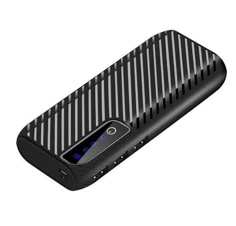 A compact black portable power bank showing dual USB output ports and displaying 20000mAh capacity.
