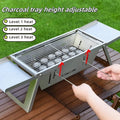 Small foldable portable charcoal grill for outdoor cooking and camping