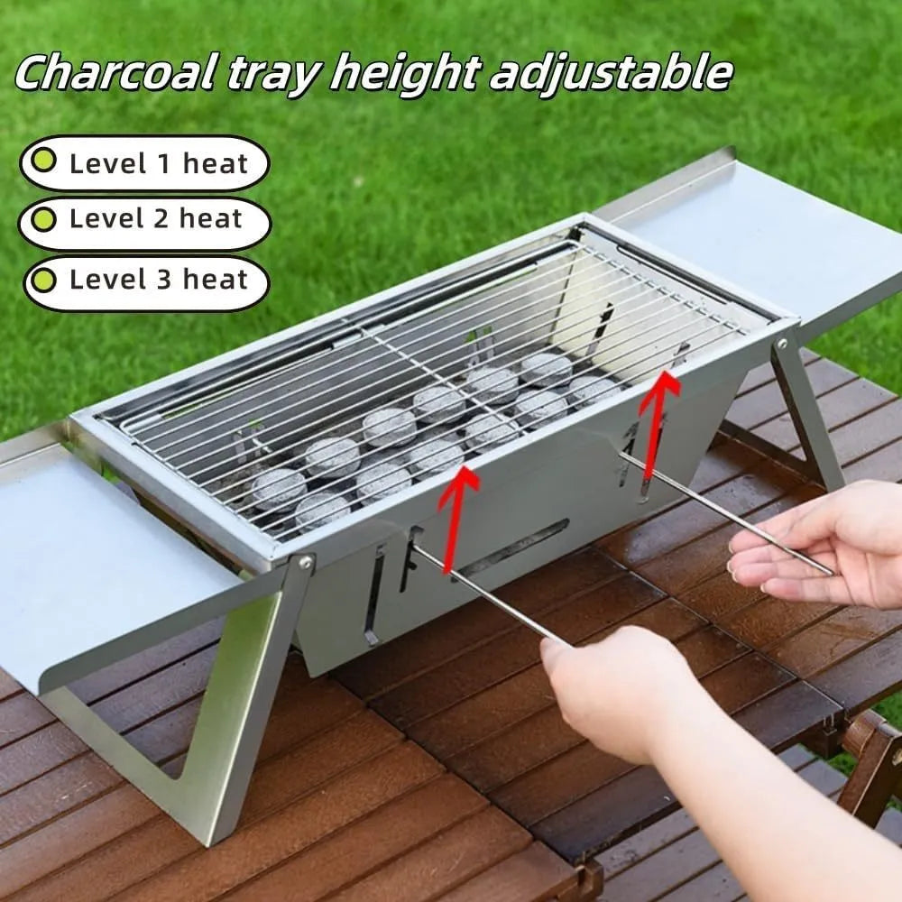 Small foldable portable charcoal grill for outdoor cooking and camping