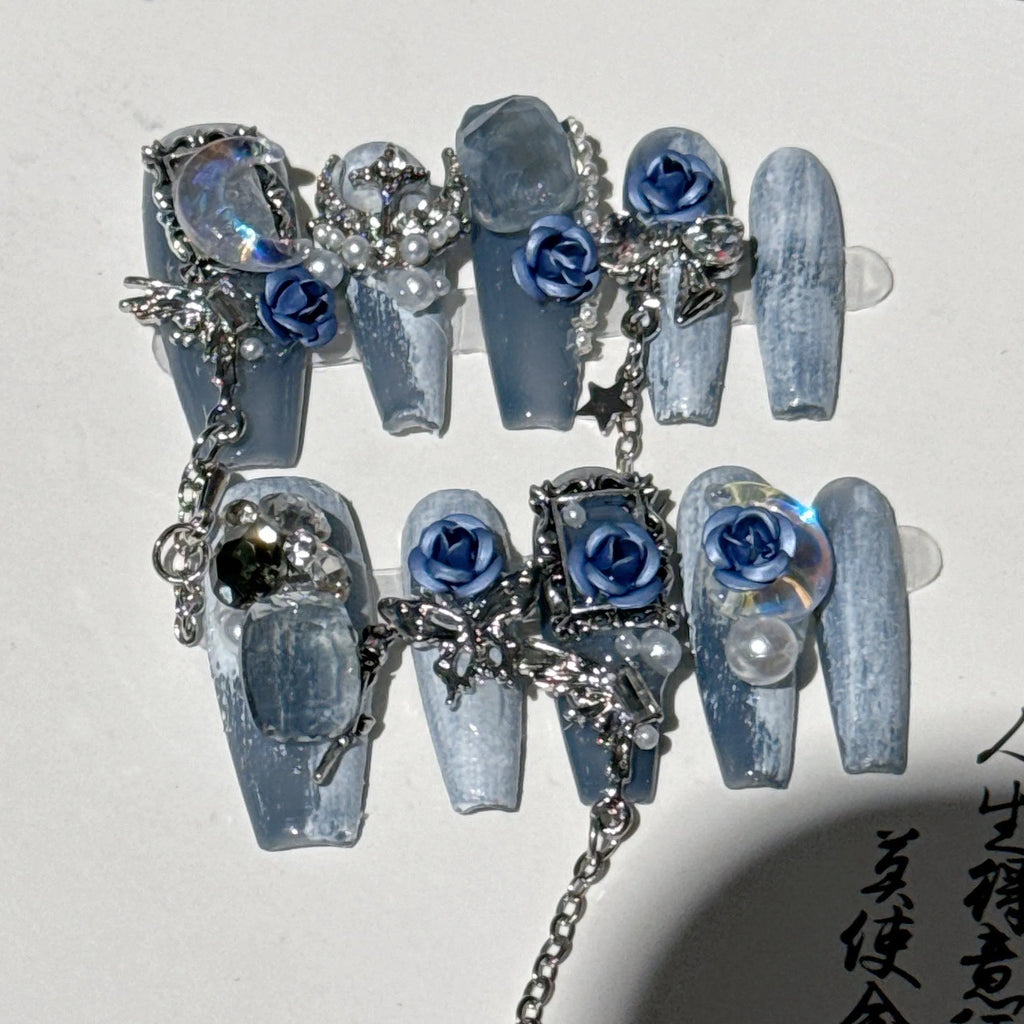 Heavy industry night blue nail stickers with ornate rose and tulip flower pattern for evening manicures.