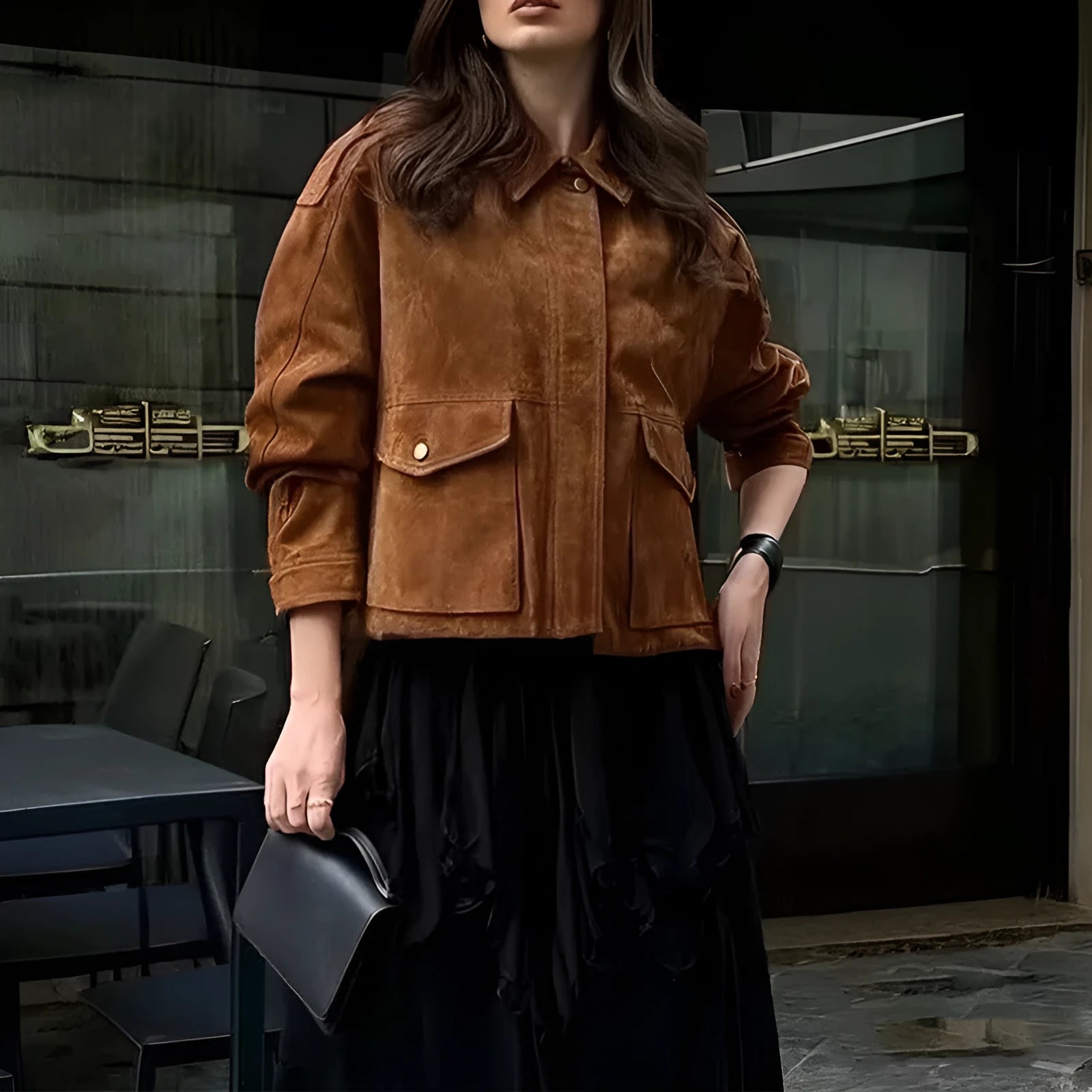 Women's suede-look polyester coat in bright brown colour with regular sleeves on mannequin