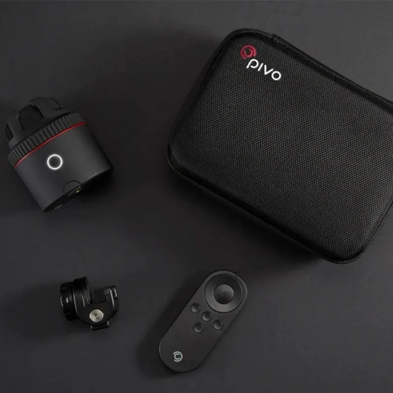 Black PIVO facial tracking camera mounted with a smartphone, showing 360-degree rotation base.