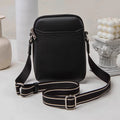 Black PU mobile phone bag with crossbody strap showing shoulder carry option